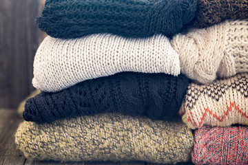 Fototapeta na wymiar a stack of knitted sweaters