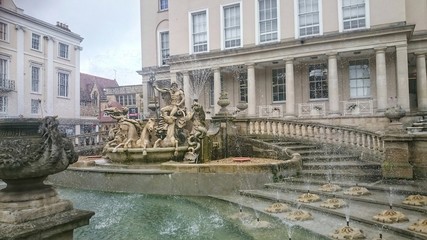 Fototapeta na wymiar Neptune fountain located in Cheltenham town centre, England 