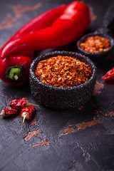 Red chili pepper on old rusty background