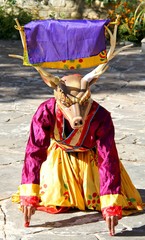 Obraz premium PARO, BHUTAN - November10, 2012 : Bhutanese dancers with colorful animal mask performs traditional dance at hotel in Paro, Bhutan