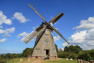 Naklejka na ściany i meble Traditional Dutch windmill in Benz, on the island of Usedom (Germany)