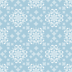 seamless damask pattern in blue. Vintage ornament. background for wallpaper, printing on the packaging paper, textiles, tile.