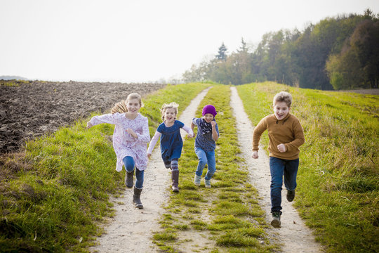 Children running on path