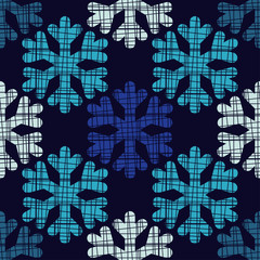 Seamless blue background with decorative snowflakes. Scribble texture. Textile rapport.