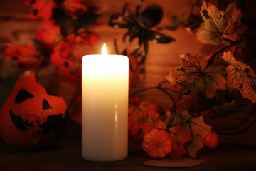 table decorations for Halloween carved pumpkin head candles