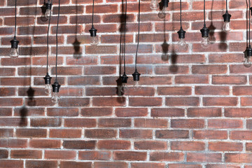 Brick wall with bulb lights lamp. nice brick show room with spotlights.