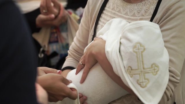 Christening ceremony in church with infant