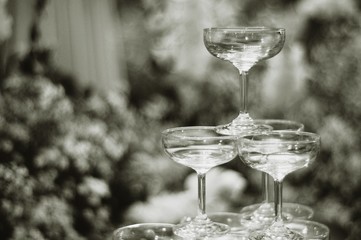 black and white champagne glass arrangement in pyramid shape 