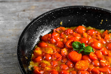 Preparing tomato sauce on pan, cooking background, italian food concept