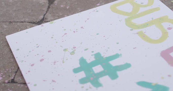 number 1 sign with splattered paint