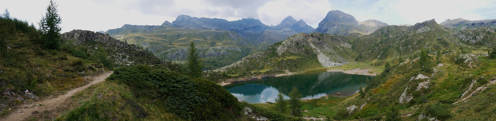 Fototapeta na wymiar Small pure alpine lake on the Bergamo Alps, northern Italy.