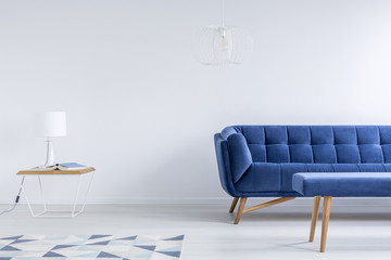 Room with navy blue couch