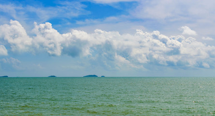 Fototapeta na wymiar A ridge of clouds over the tropical sea