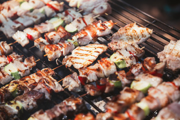 Roasted meat cooked at barbecue. Grill on charcoal and flame.