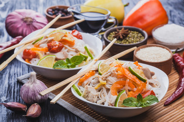 delicious Korean rice noodles with chicken.