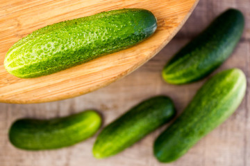 Fresh cucumbers on wooden