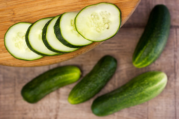 Fresh cucumbers on wooden