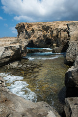 Blue hole and the collapsed Azure window. Gozo, Malta