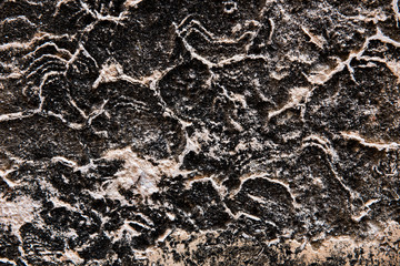 Antique eroded limestone wall texture