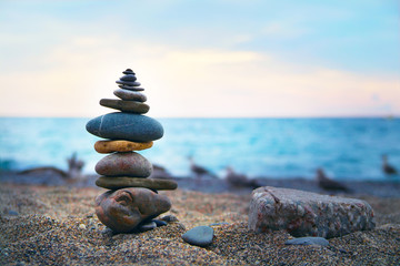Stones laid out in the form of a pyramid on the seashore