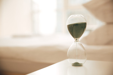 Hourglass on table indoors