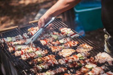 Roasted meat cooked at barbecue. Grill on charcoal and flame.