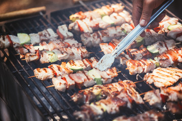 Roasted meat cooked at barbecue. Grill on charcoal and flame.