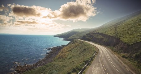 Road by sea against sky