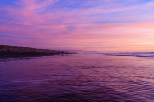 Blue, Pink, And Purple Sky At Ocean Beach Sunset