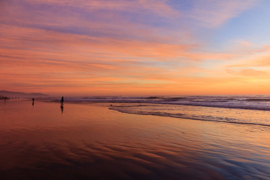 Blue, Pink, And Purple Sky At Ocean Beach Sunset