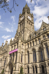 Fototapeta na wymiar Manchester Town Hall in Albert Square, seat of local government, is an example of Victorian era Gothic revival architecture.