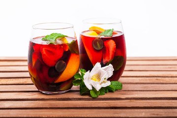 Summer Red Wine Sangria Drink Isolated on White Background. Selective focus.