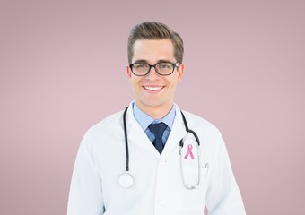 Fototapeta premium Doctor man with breast cancer awareness ribbon