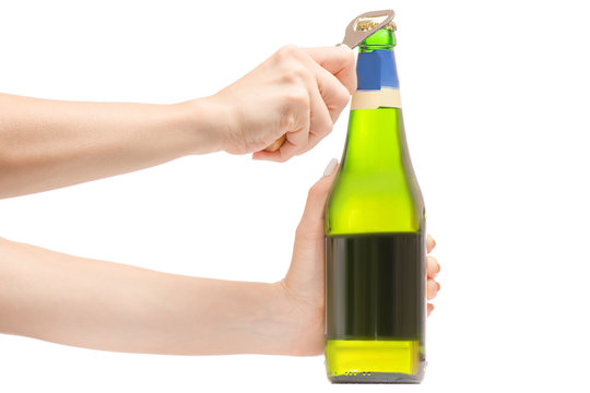 Female hands with a bottle of beer with open