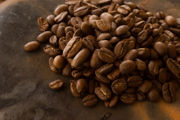 coffee beans on a brown pot