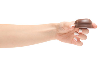 Female hand with chocolate candy