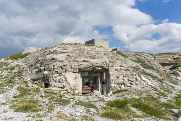 entrance of a old bunker in the alps