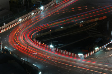 Fototapeta na wymiar Speed light trail on night street, long exposure