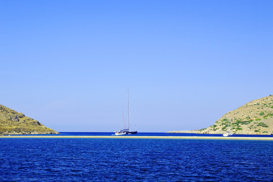 Fototapeta yachting, boat on sea between two shores