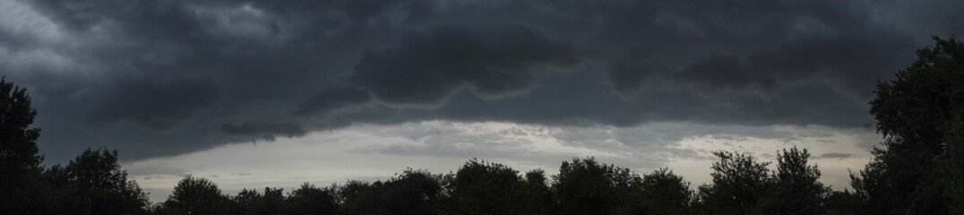 Fototapeta na wymiar sky dark clouds before the rain summer panorama