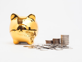 Piggy bank gold color and stack of money safe.