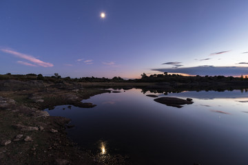 Dusk in the Natural Area of the Barruecos. Malpartida de Caceres. Extremadura. Spain.
