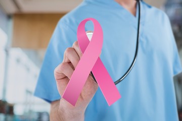 Doctor with breast cancer awareness ribbon