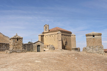 Church near castle in Ampudia, Castilla y Leon, Spain