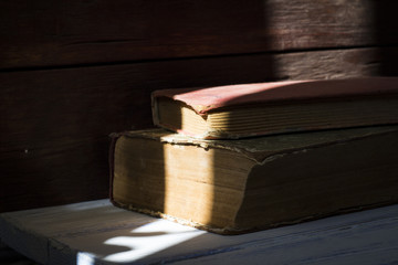 Beautiful image of two vintage books under natural light
