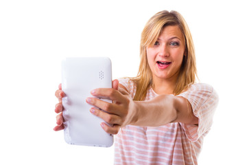 Woman taking self picture with tablet