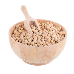 Soybeans in a wooden cup isolated on white background