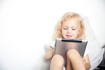 Child using tablet computer