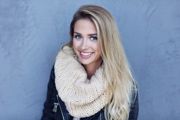 Obraz premium Outdoor close up portrait of young beautiful happy smiling woman