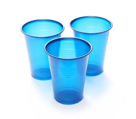 Blue, plastic cups isolated on white background